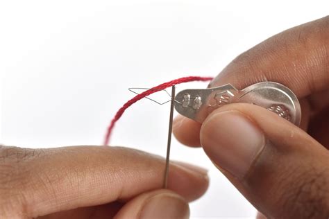 how to thread an embroidery needle and why the act of threading can teach us about perseverance